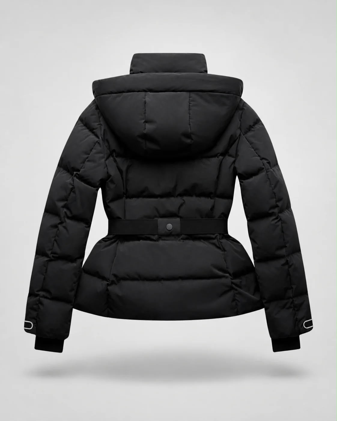 Black puffer jacket shown from the back, featuring a hood, quilted padding, a defined waist belt with a central snap button, and ribbed cuffs, photographed on a light gray studio background.